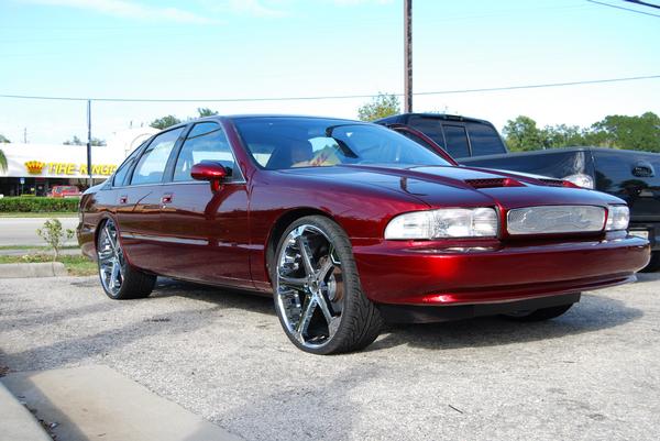 Chevy Impala car stereo MTX Audio speakers and amps. Fiberglass enclosure and door panels. Explicit Customs Melbourne Suntree Viera Florida