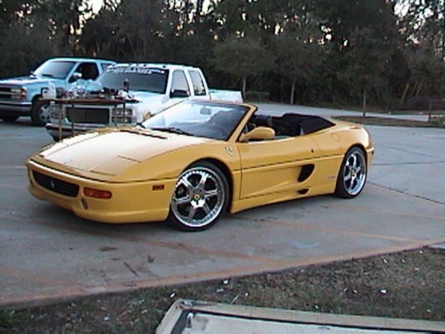 Ferrari F355 custom car stereo using kicker audio. Custom fiberglass enclosure and doors. Explicit Customs Melbourne Suntree Viera Florida