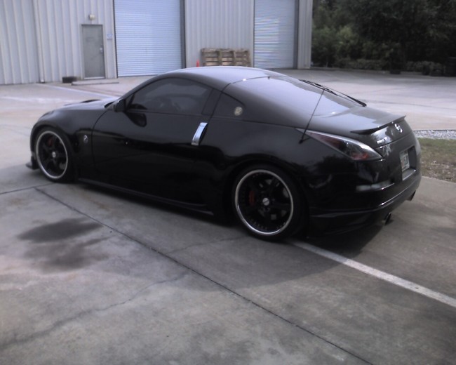 2000 Chevy Silverado Truck custom car stereo, air ride suspension, paint, fabrication, brakes. Explicit Customs Melbourne Suntree Viera Florida