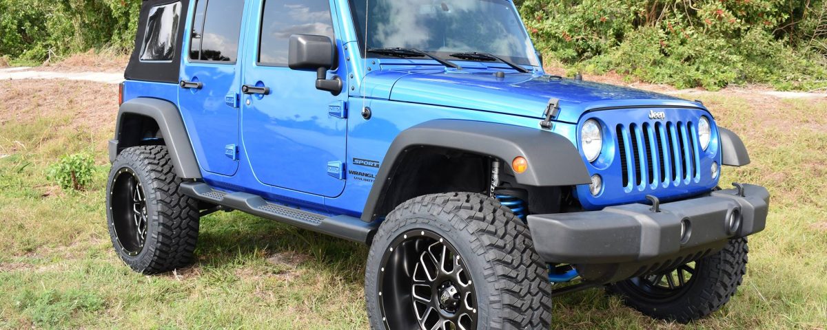 2015 Jeep Wrangler with 3.5" Rubicon lift kit, Fox shocks, Fox steering stabilizer, Fuel Grenade wheels, and 35" Nitto tires