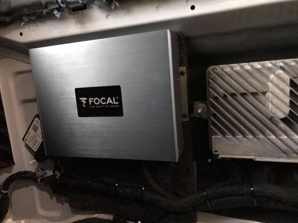 2015 GMC Yukon Denali car stereo with Focal speakers and amplifiers, JL Audio Subwoofers, and JL Audio factory integration