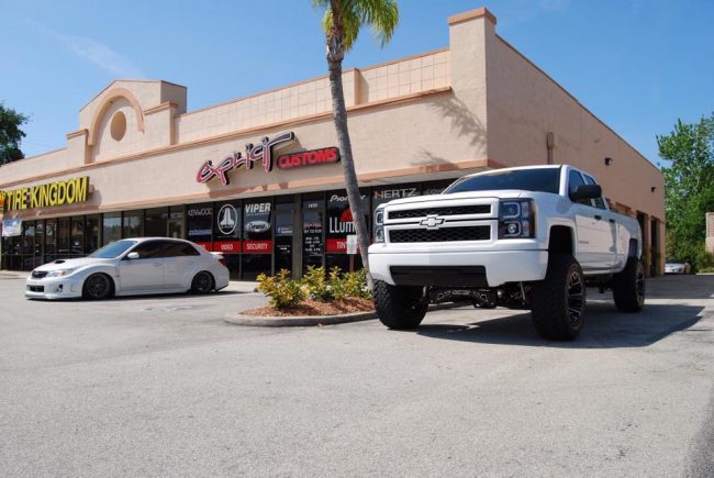 2015 Chevy Silverado with Mcgaughys Suspension truck lift kit installation in Melbourne FL Explicit Customs