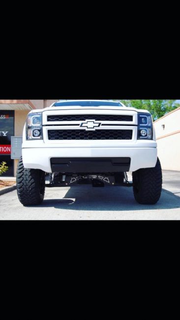 2015 Chevy Silverado with Mcgaughys Suspension truck lift kit installation in Melbourne FL Explicit Customs