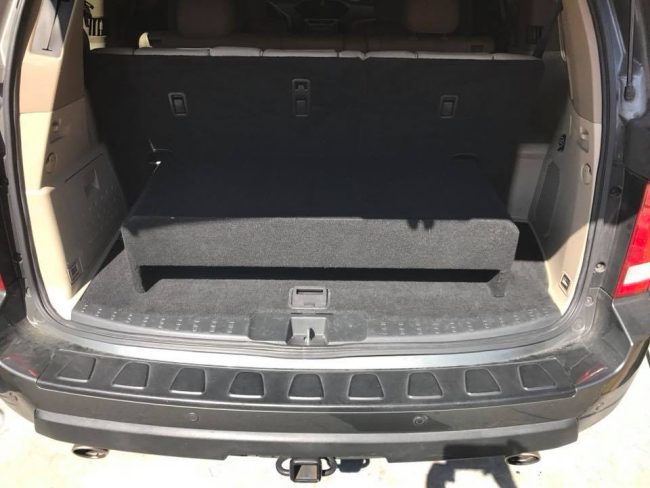 honda pilot down firing subwoofer box and jl audio amp installtion in Melbourne by Explicit Customs