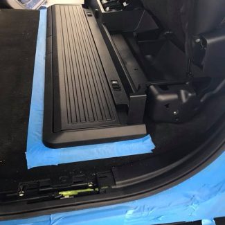 Ford F250 subwoofer box installation under rear seat by Explicit Customs Melbourne FL